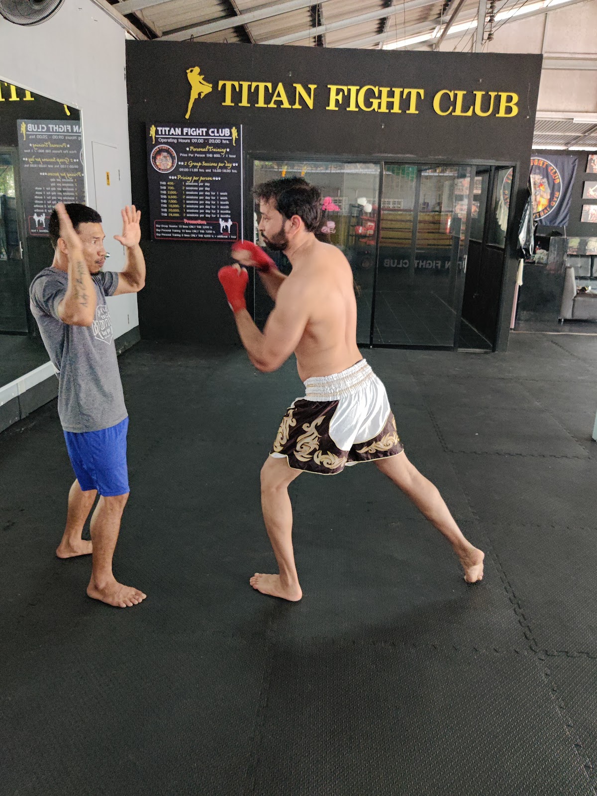 Muay Thai training session with coach